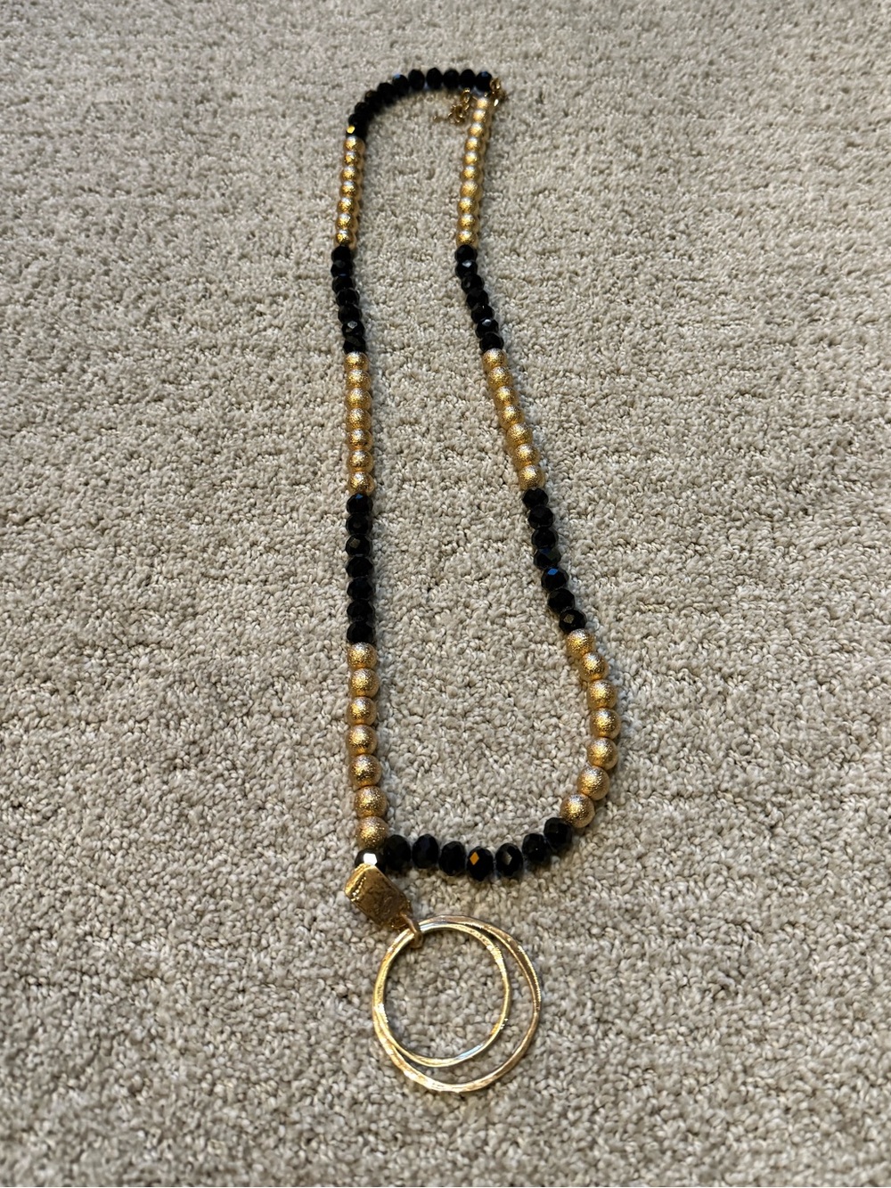 Gold and Black Beaded Pendant Necklace